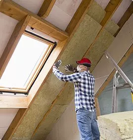 installing attic insulation in home